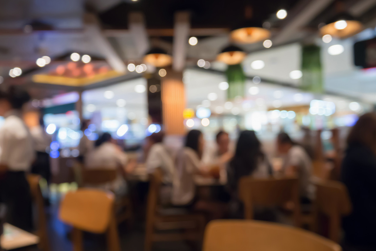 People-in-restaurant-cafe-interior-with-bokeh-light-blurred-customer